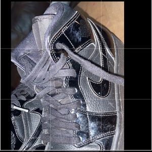 black air jordan 1’s